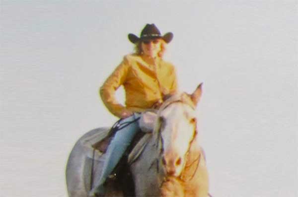 Deb riding on a horse